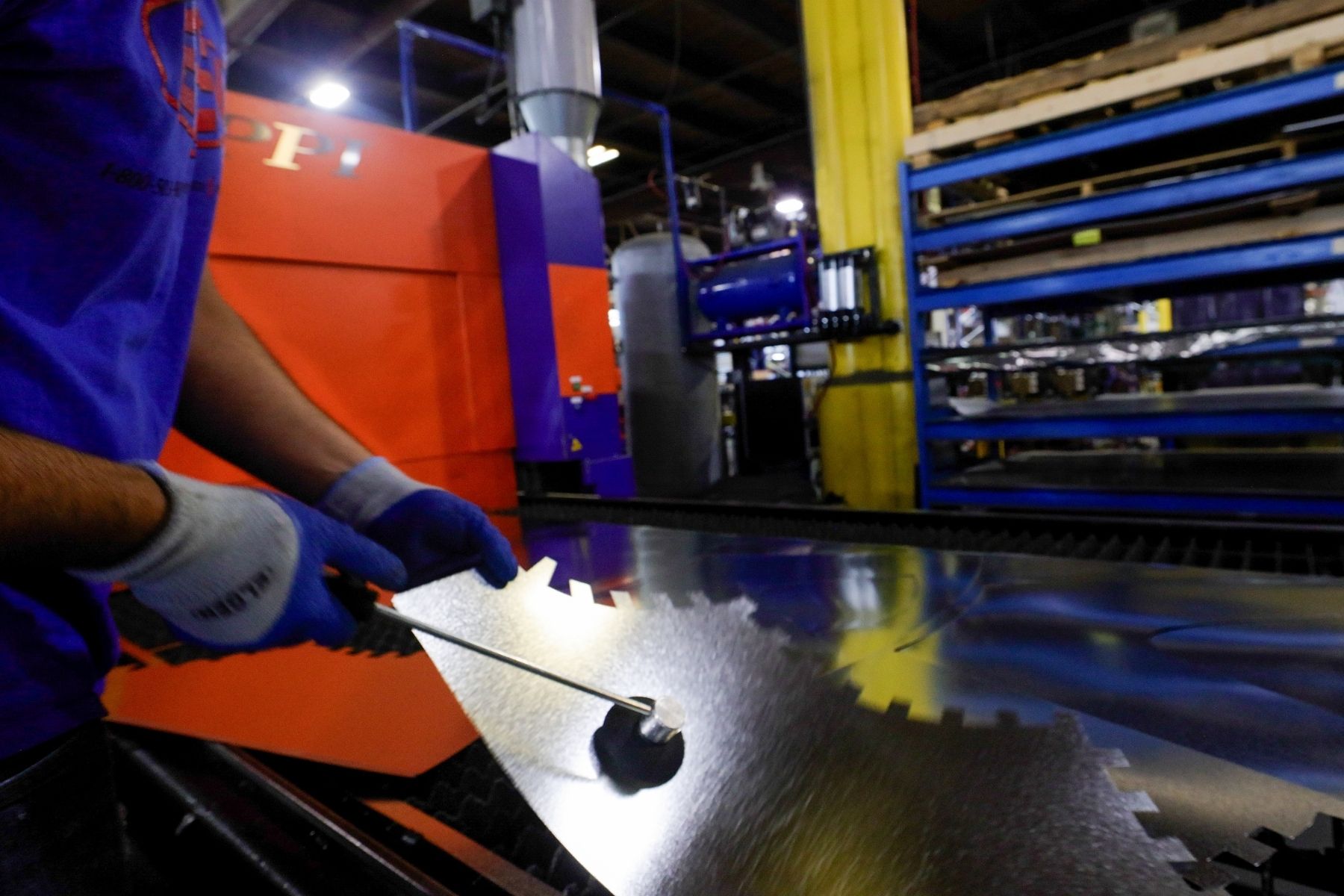Person polishing metal part